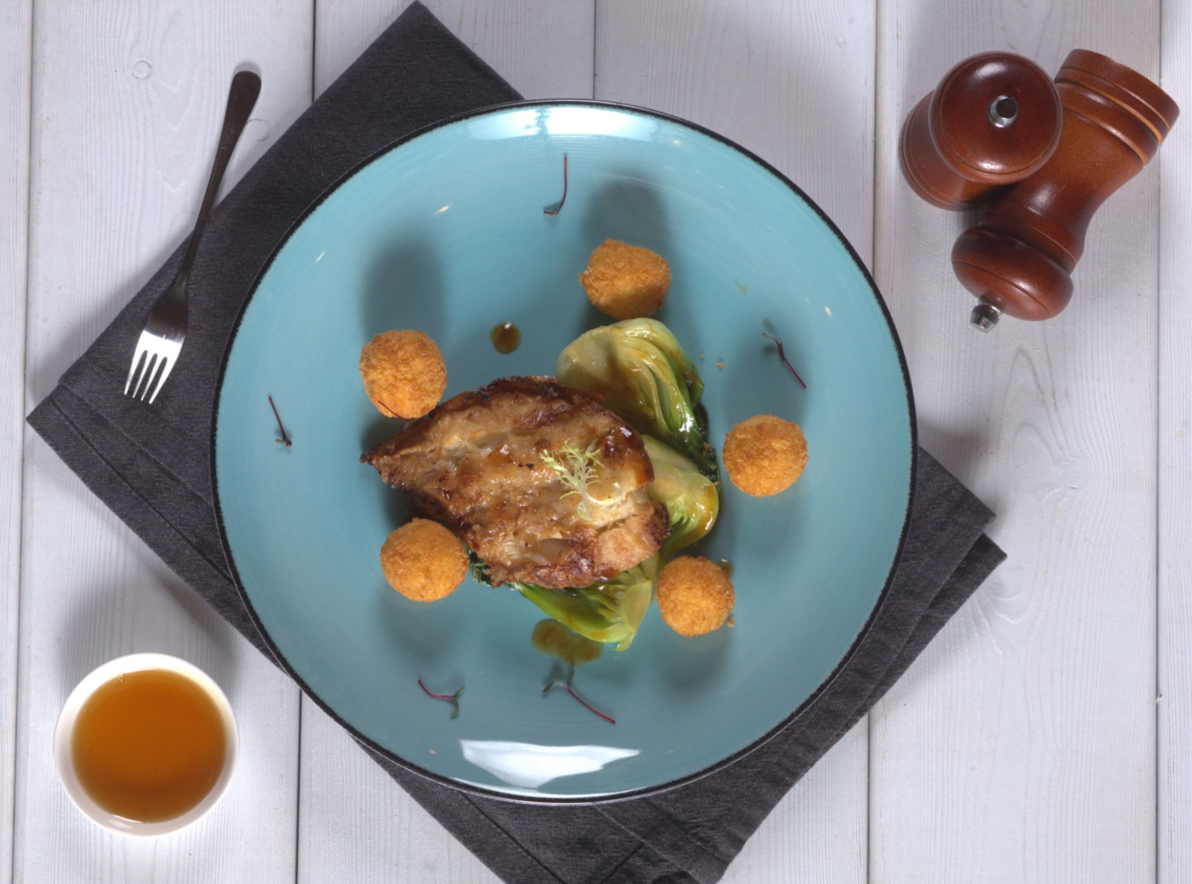 Fried Pacific grenadier with bok choy cabbage